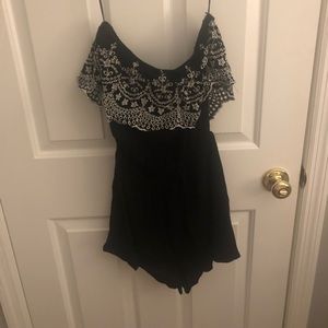 Black off the shoulder romper.